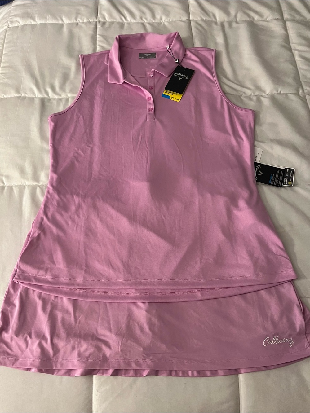 Callaway Women's Light Pink Sleeveless Polo and Skort Golf Set.